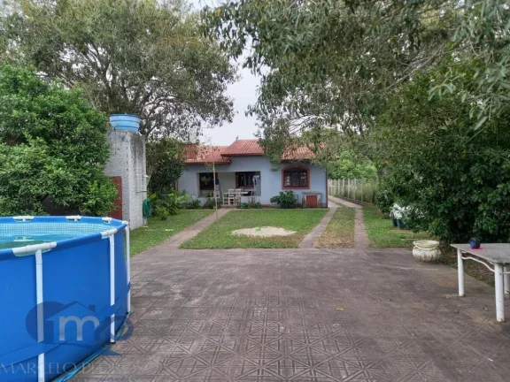 Imagem Casa à venda com 3 dormitórios na Itapeva Sul em Torres/RS