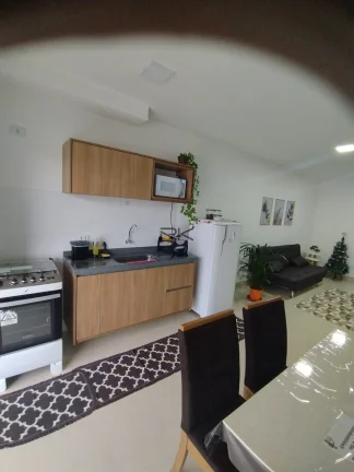 Imagem APARTAMENTO NO PEREQUE AÇU COM 2 DORMITÓRIOS SENDO 1 SUÍTE, PISCINA, ELEVADOR, VARANDA GOURMET COM CHURRASQUEIRA