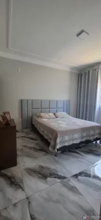 Imagem Casa à Venda no Jardim Panorâmico em Patos de Minas – 3 Quartos, Suíte e 2 Garagens