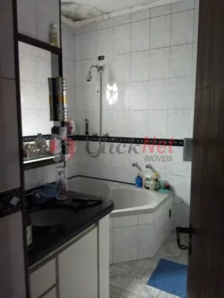 Imagem Sobrado com Salão Comercial no bairro Mauá em São Caetano
