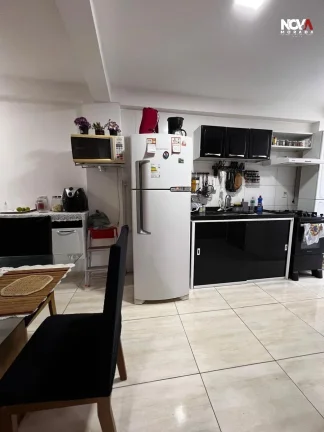 Imagem Descubra este aconchegante apartamento à venda no Edifício Santos 3, localizado no bairro Nova Ita...
