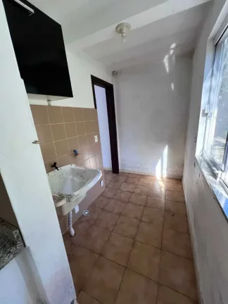 Imagem Terreno de 340m² com casa de 2 dormitórios e 1 vaga de garagem Zimbros