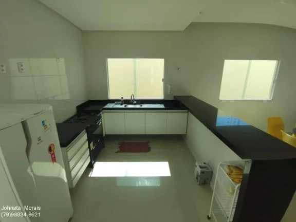 Imagem Casa de Alto Padrão na Aruana: 5 quartos, 4 suítes, posição Leste - Confira!