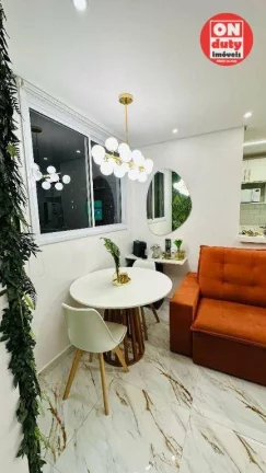Imagem Apartamento com 2 dormitórios à venda, 46 m² por R$ 340.000,00 - Areia Branca - Santos/SP