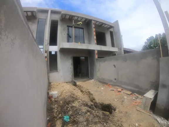 Imagem Sobrado à venda no bairro Gravatá na cidade de Navegantes - Apenas 250m do mar com Adriano carpes Imóveis.