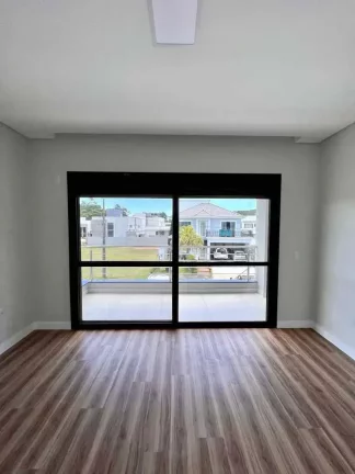 Imagem Casa em condomínio com 4 dormitórios sendo 3 suítes e 4 vagas - Camboriú/SC