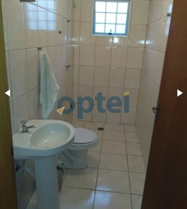 Imagem Casa Mobiliada com 240 m², sendo 3 quartos 1 suite, 4 banheiros, 3 vagas com área gourmet com churrasqueira,Piscina, forno de lenha e forna de pizza.