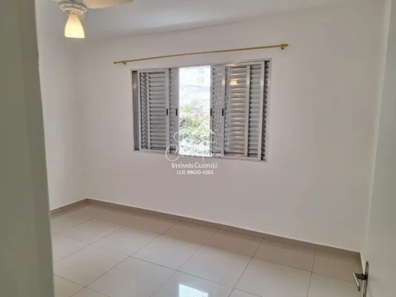 Imagem Imperdível oportunidade, apartamento de 2 quartos sem mobília na rua mais desejada do Guarujá-SP - 65m² - 1 vaga de garagem
