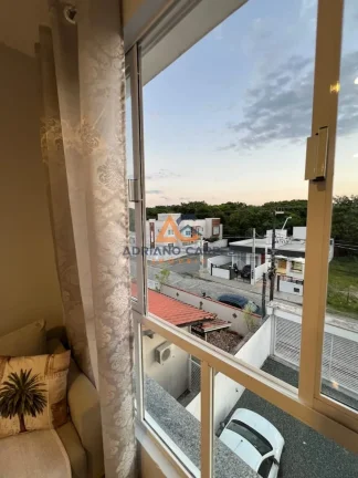 Imagem Apartamento com 02 dormitórios, 01 banheiro e 01 vaga de garagem, localizado na Meia Praia em Navegantes - Adriano Carpes Imóveis vende