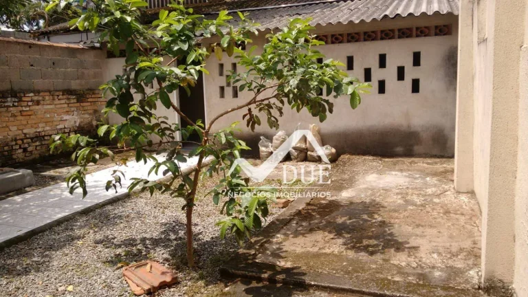 Imagem Casa com 2 dormitórios à venda, 257 m² por R$ 1.100.000,00 - Vila Matias - Santos/SP