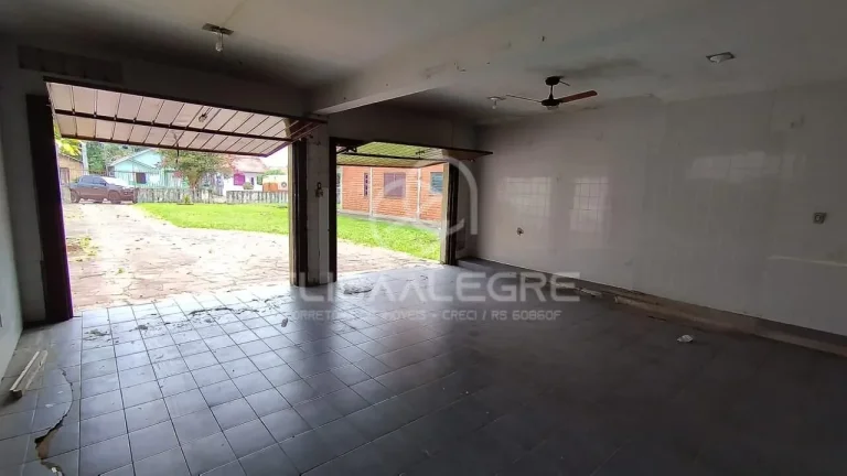 Imagem Sobrado + casa auxiliar em terreno de 1.864m² em Esteio