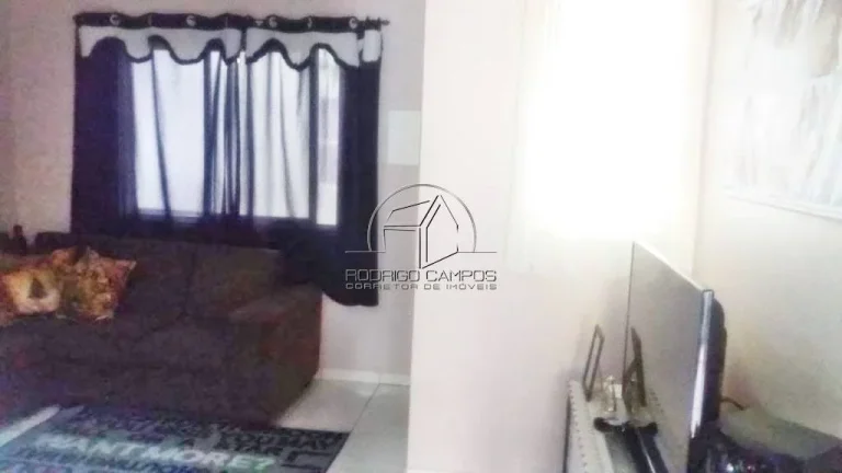 Imagem Casa Geminada à Venda em Tude Bastos, Praia Grande - 2 Quartos e Churrasqueira