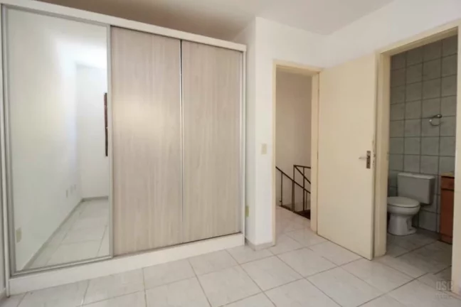 Imagem VNMC 100 Casa 610191037-89 - Casa à venda no bairro Vila Nova - Porto Alegre/RS