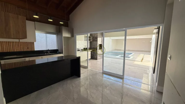 Imagem Casa térrea 3 suítes no condomínio bosque três marias com piscina e varanda