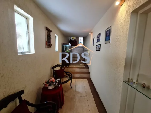 Imagem Oportunidade única, casa com 4 suítes, 5 vagas e piscina.