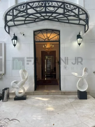 Imagem Venha conhecer esta magnífica casa disponível para aluguel, localizada no desejado bairro Jardim América, em São Paulo. Com uma área total de 1215m² e