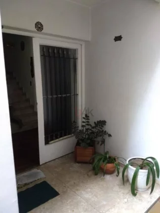 Imagem Casa com 3 dormitórios à venda, 234 m² - Moema - São Paulo/SP