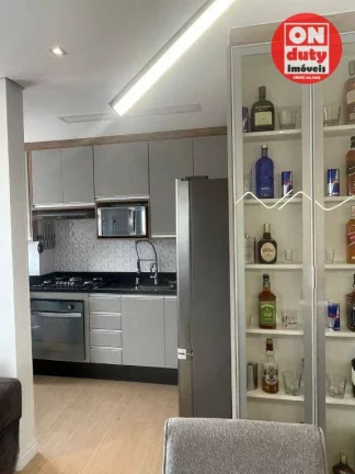 Imagem Apartamento com 2 dormitórios à venda, 45 m² por R$ 320.000,00 - Areia Branca - Santos/SP