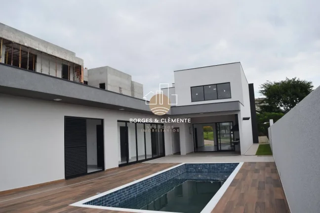 Imagem Casa com 4 Suítes e Design Moderno em condomínio