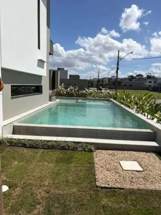Imagem Casa alto padrão em condomínio fechado, 4 suítes sendo 1 master e 4 vagas, em Camboriú/SC