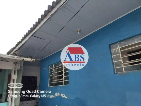 Imagem casa com duas lojas e uma edícula