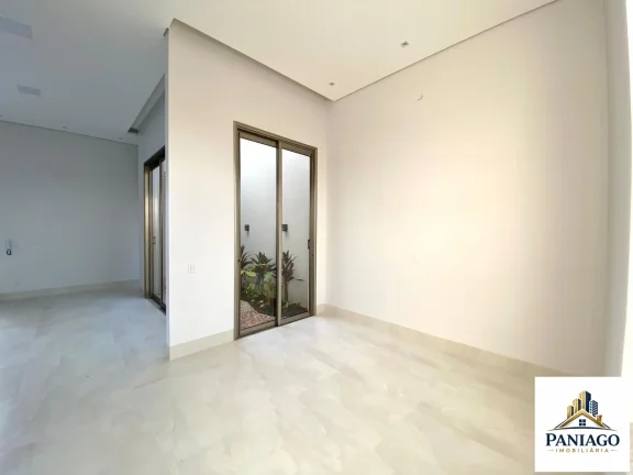 Imagem Casa de alto padrão com 3 suítes, cozinha gourmet e piscina com cascata