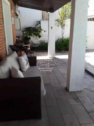 Imagem Imperdível casa à venda na Enseada, Guarujá-SP! 5 quartos, 3 suítes, 2 salas, 4 banheiros, 2 vagas de garagem. Confira!