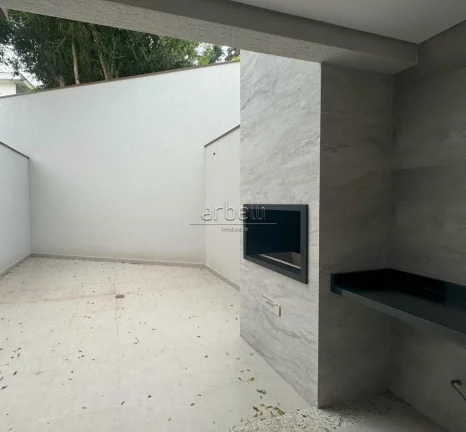 Imagem Sobrado com 170 M² com 3 dormitórios suítes, sala, lavabo, cozinha, área de serviços, churrasqu...