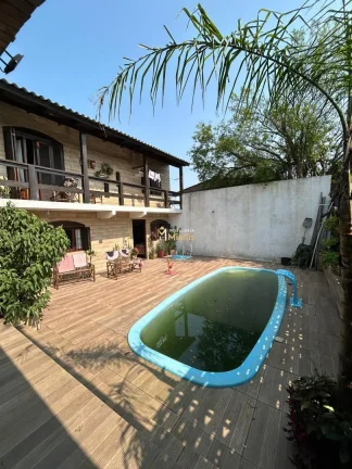 Imagem Casa com 2 Dormitorio(s) localizado(a) no bairro Jardim Krahe em Viamão / Rio Grande do Sul Ref.:57580517