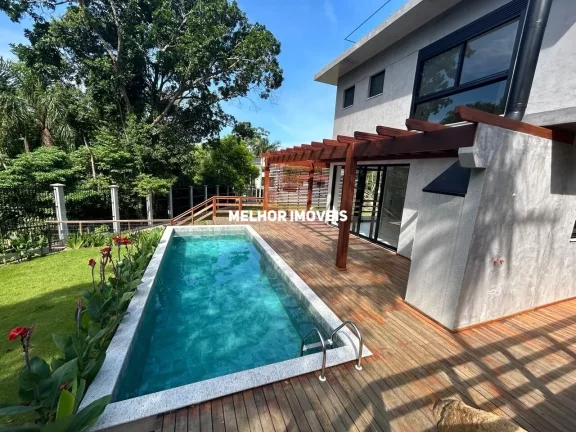 Imagem Casa de Alvenaria nova com 3 suítes localizada na Praia de Taquaras em Balneário Camboriú - SC