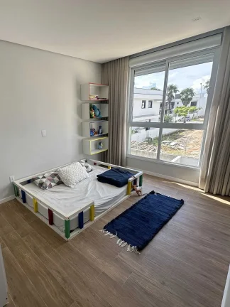 Imagem Casa com 3 dormitórios sendo 1 suíte e 2 vagas de garagem em Biguaçu/SC