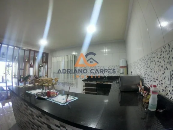 Imagem Adriano Carpes Imóveis vende - Casa com dois dormitórios, sendo uma suíte, com piscina no Bairro Nossa Senhora de Fatima em Penha -SC