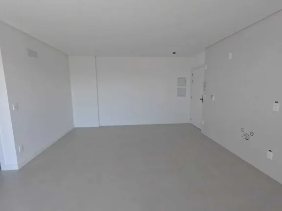 Imagem Apartamento com 2 dormitórios sendo 1 suíte e 2 vagas de garagem na Praia Brava/SC