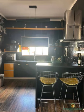 Imagem Linda casa moderna com 3 suítes e área de lazer com piscina em condomínio