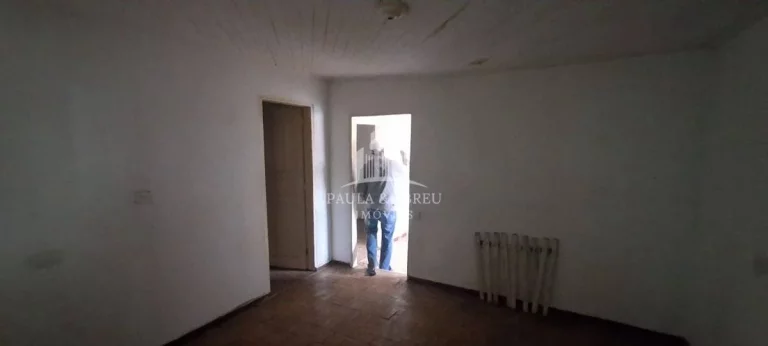 Imagem Terreno 300m² (10 X 30mts) com Casa Antiga com 6 Cômodos, Escritura no Jardim Zaíra 2, Mauá-SP