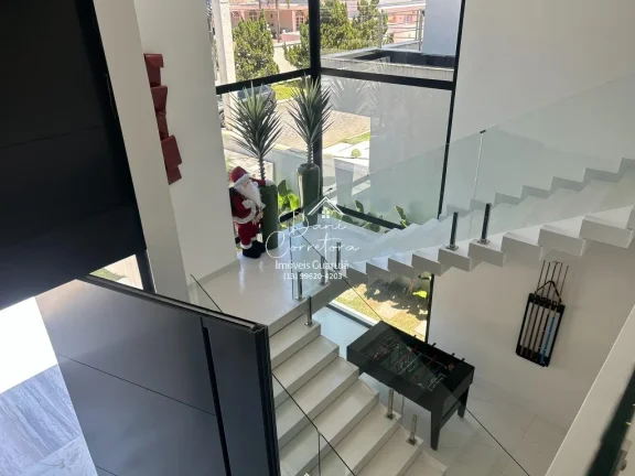 Imagem Luxuosa Casa nova e atualizada em Condomínio à Venda no Jardim Acapulco, Guarujá-SP: 6 Quartos, 6 Suítes, 3 Salas, 7 Banheiros, 6 Vagas, 530m²
