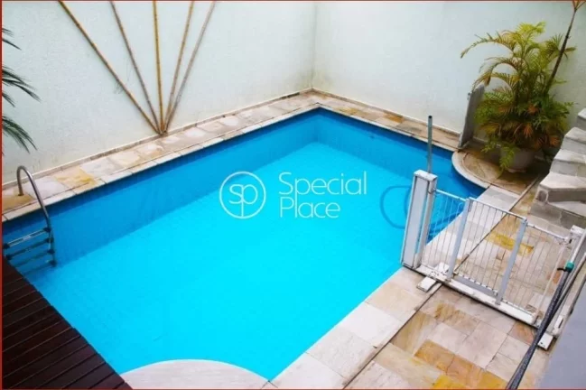 Imagem Casa de condomínio de alto padrão com 4 Suites com armários, escritório, Varanda, Living 2 ambie...