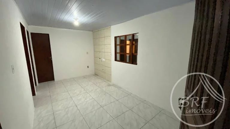 Imagem Vendo terreno com três casas e uma Kitnet em Serraria, São José SC