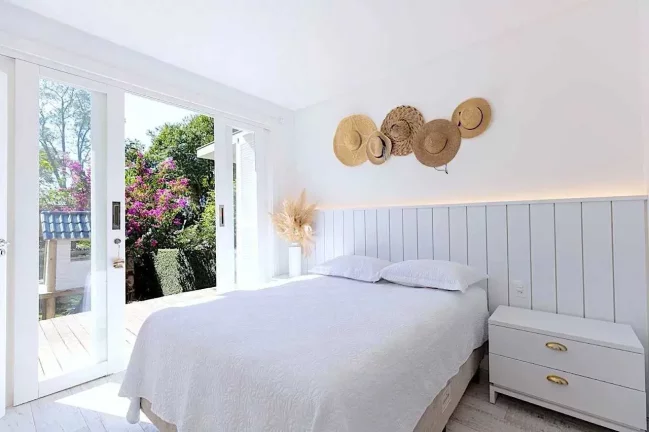 Imagem Casa com 3 dormitórios sendo 2 suítes com jardim e piscina Praia de Taquaras, Balneário Camboriú SC