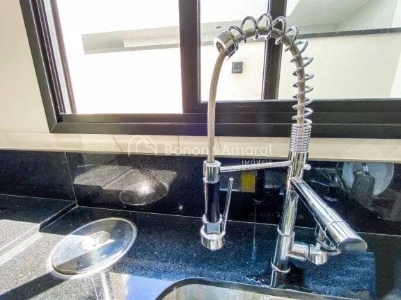 Imagem Casa térrea com 3 suítes, cozinha americana integrada às salas de estar e jantar, e área gourmet...