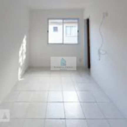 Imagem Casa em Condomínio à Venda em Vargem Pequena, Rio de Janeiro-RJ: 3 Quartos, 1 Suíte, 1 Sala, 2 Vagas de Garagem, 77m²