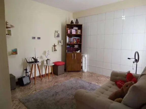 Imagem Prédio com dois apartamentos, ponto comercial e terraço com capacidade para expansão de mais dois andares.