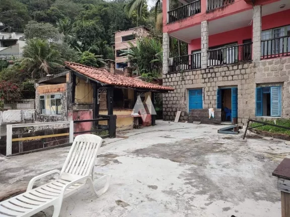 Imagem Casa Padrão à venda com 6 dormitórios pé na areia no Parque Prainha em São Vicente/SP
