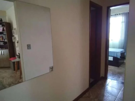 Imagem Prédio com dois apartamentos, ponto comercial e terraço com capacidade para expansão de mais dois andares.