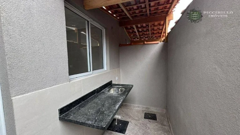 Imagem Sobrado com 2 dormitórios à venda, 49 m² por R$ 350.000 - Maracanã - Praia Grande/SP