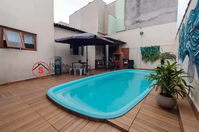 Imagem SOBRADO COM 3 DORMITÓRIOS A VENDA NA VILA LÚCIA, PRÓXIMO AO LARGO DA VILA ZELINA. QUINTAL COM PISCINA AQUECIDA E CHURRASQUEIRA. 5 VAGAS DE GARAGEM.