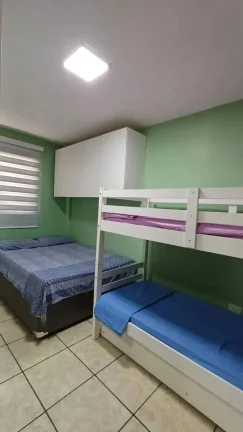 Imagem Apartamento com 2 dormitórios sendo 1 suíte e 1 vaga no Centro de Balneário Camboriú/SC