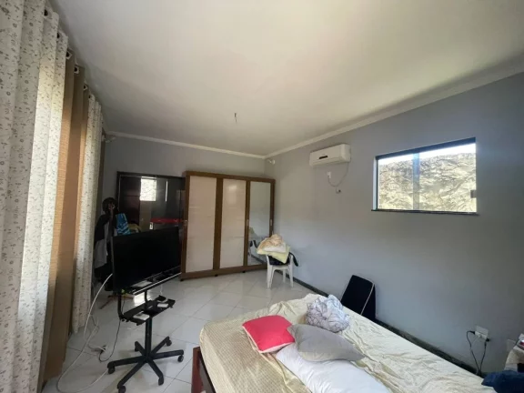 Imagem Casa à Venda em Aruana I: 3 Suítes, Área Gourmet, Próximo à Praia!