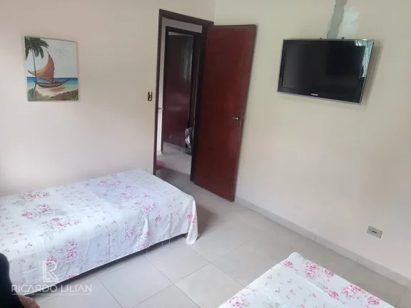 Imagem Casa de esquina em Caragua com 3 dormitorios e piscina a venda.