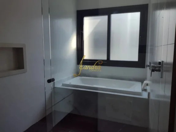 Imagem Belíssima Sobrado no Condomínio Enseada!Cmposto por 05 suítes piscina